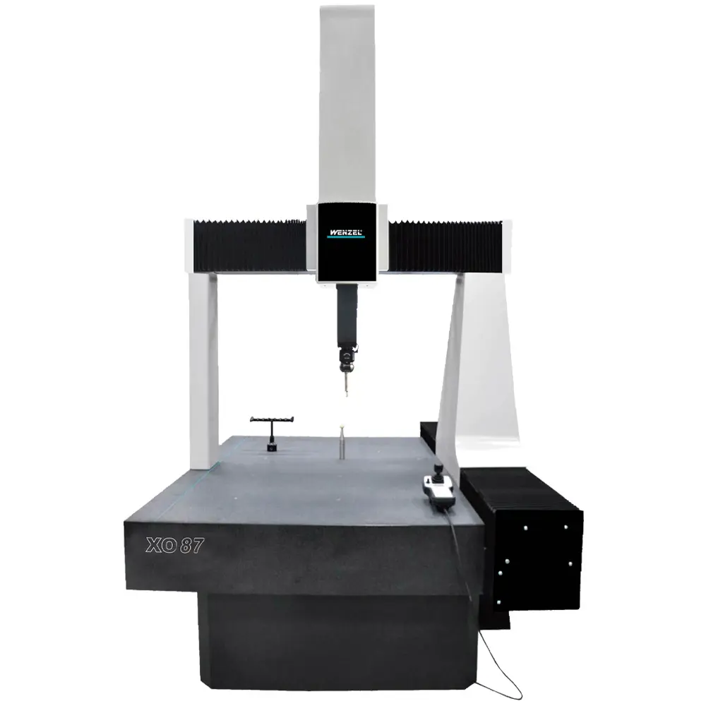 X-Orbit CMM with overhead on horizontal bridge over black base.