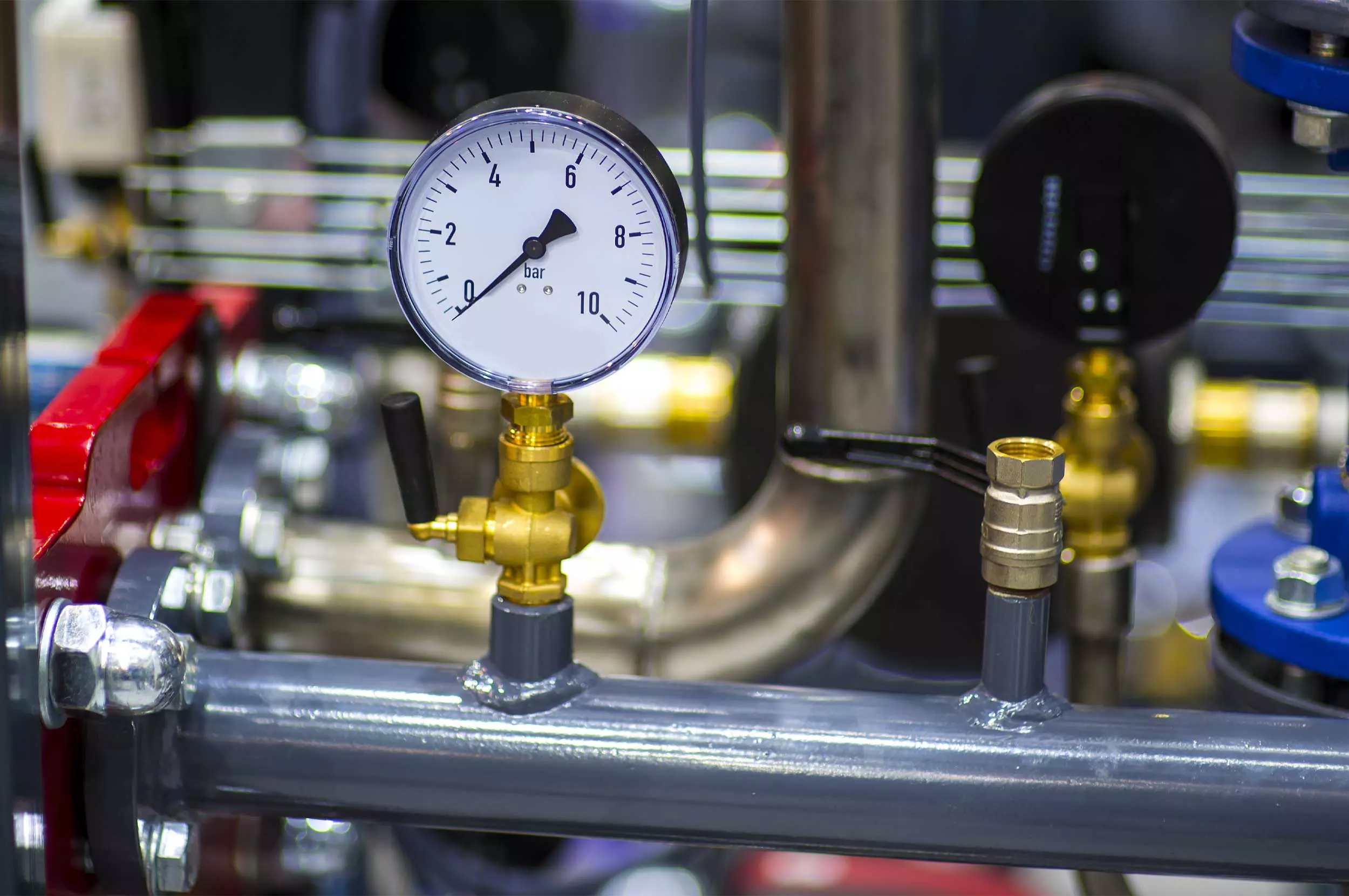Pressure Gauge PSI Meter in pipe and valves of a water system