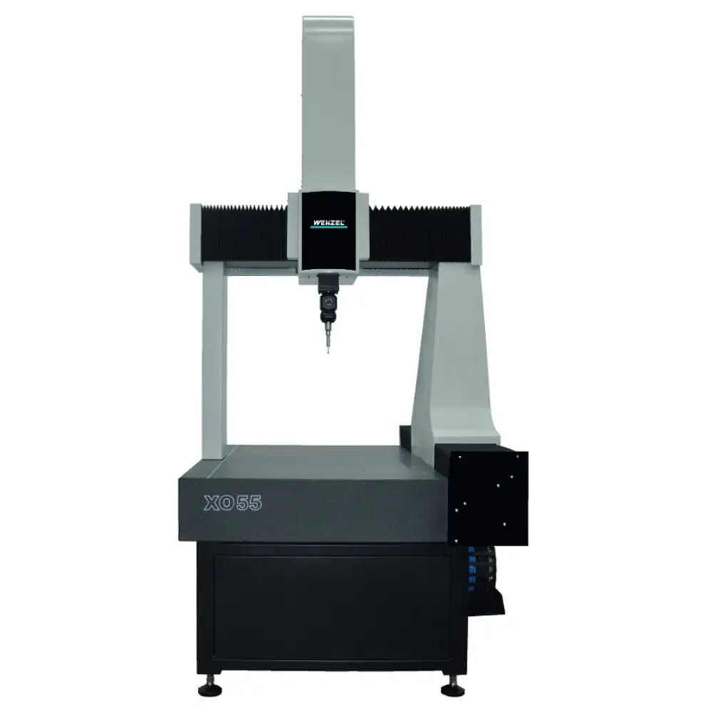 X-Orbit CMM with overhead on horizontal bridge over black base.