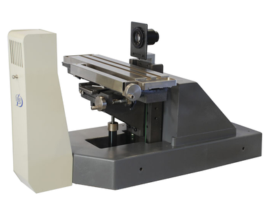 Piece of optical comparator machine.