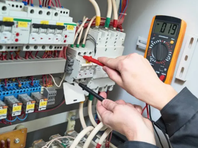 Person utilizing calibration tools in machine.