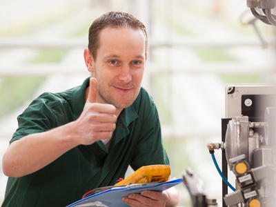 Technician with thumbs up.